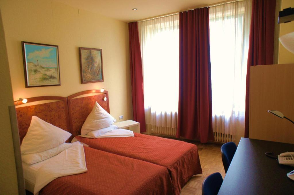 City Hotel MHG Habitación foto