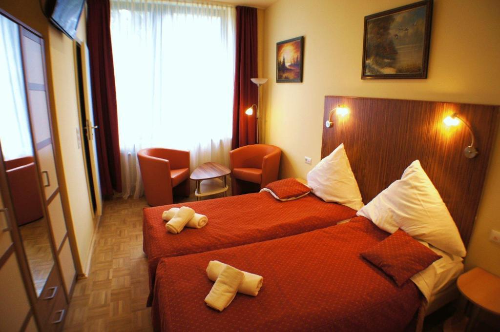 City Hotel MHG Habitación foto